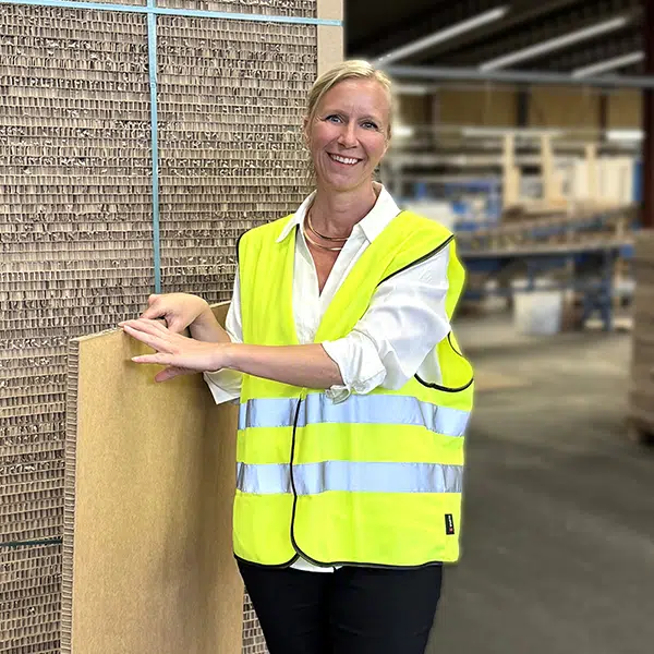 Nina-PORTRAIT-at-Honeycomb-Board-production-section-small.png